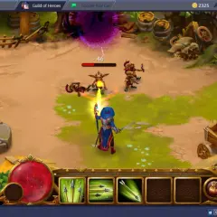W grze Guild of Heroes mag walczy z goblinami. Bohater rzuca zaklęcie, zadając obrażenia.