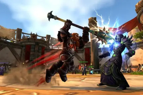 Krasnoludzki wojownik z młotem walczy z nekromantą. Wybór talentów dla **arms warrior** decyduje o sile ciosów.