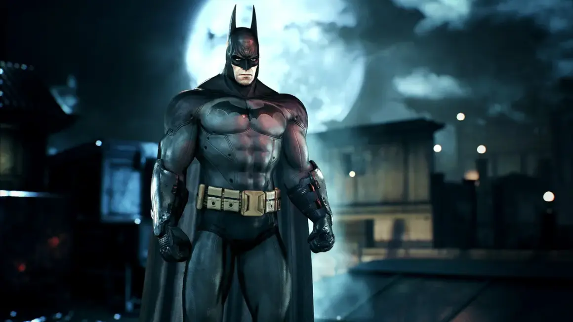 Batman stoi na tle księżycowej nocy nad Arkham. Ciemna sylwetka Mrocznego Rycerza, gotowego do akcji w Azylu Arkham.