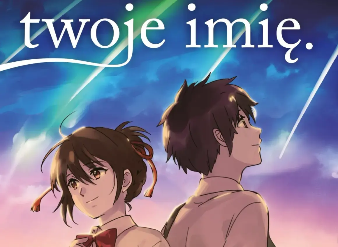 Dwoje młodych ludzi, bohaterów anime "twoje imię", patrzy w niebo.