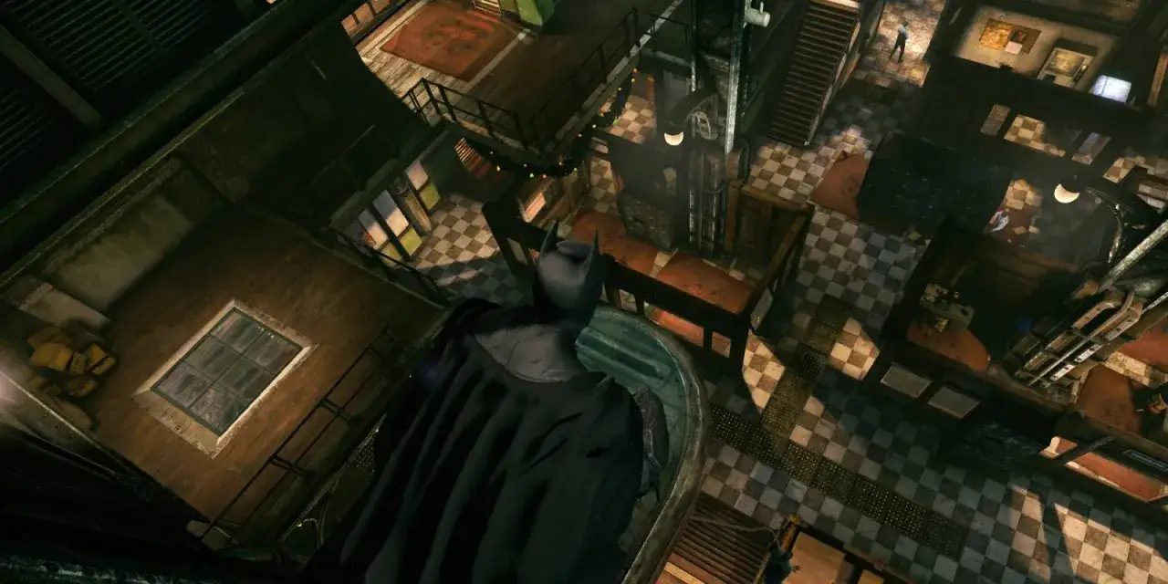 Batman obserwuje wnętrze Azylu Arkham, gotowy do akcji.