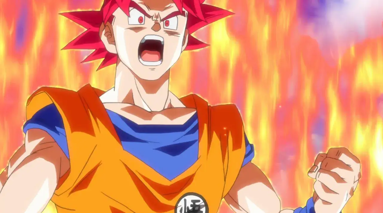 Goku w formie Super Saiyan God, z ognistym tłem, gotowy do walki w Dragon Ball.