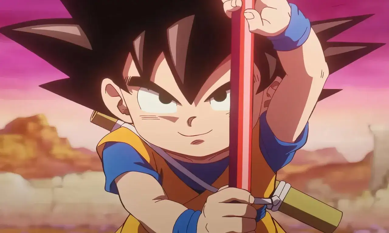 Młody Goku z Dragon Ball, trzymający kij, gotowy do walki. Kolejność przyg&oacute;d zaczyna się od niego!