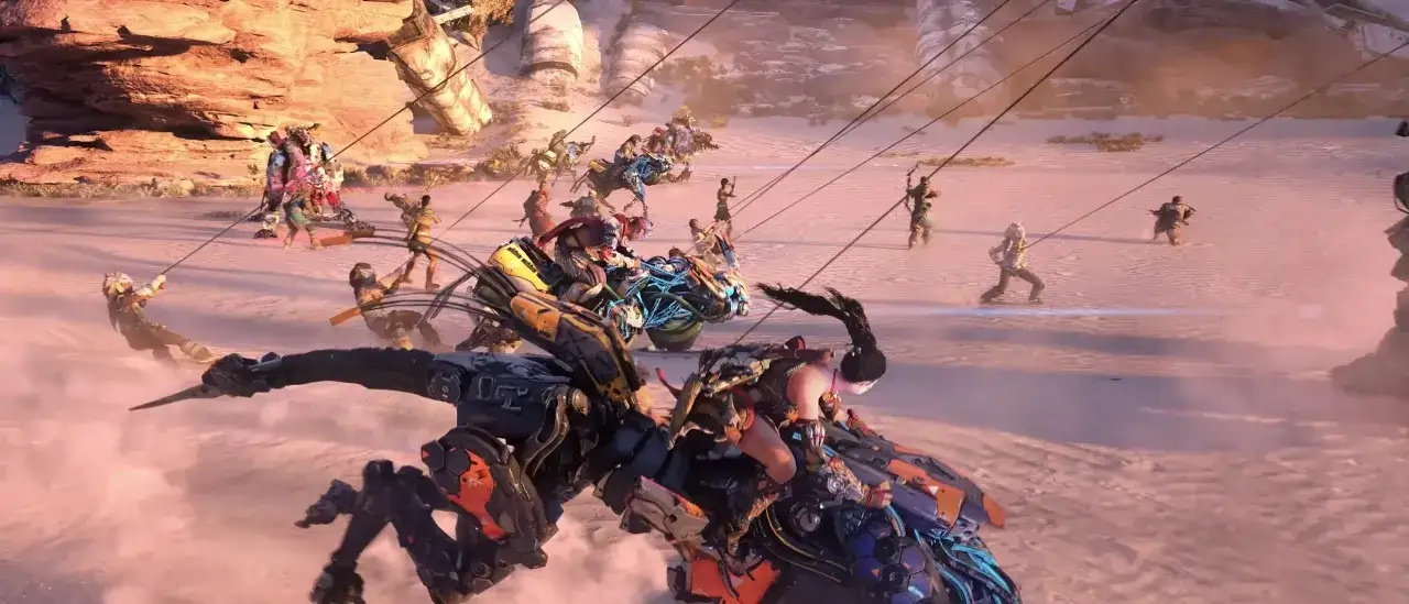 Aloy i jej sojusznicy walczą z mechanicznymi bestiami na pustynnych horizon steel frontiers.