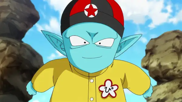 Pilaf z Dragon Ball w żółtej koszuli i czapce z czerwoną gwiazdą.