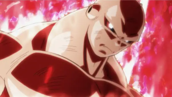 Jiren w czerwonej poświacie, gotowy do walki w Dragon Ball Super odc 130. Jego mięśnie napinają się, a oczy płoną determinacją.